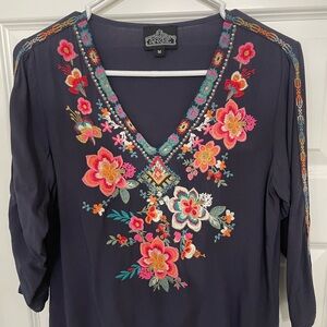 Navy embroidered blouse with 3/4 sleeves and slit at ends. Size medium